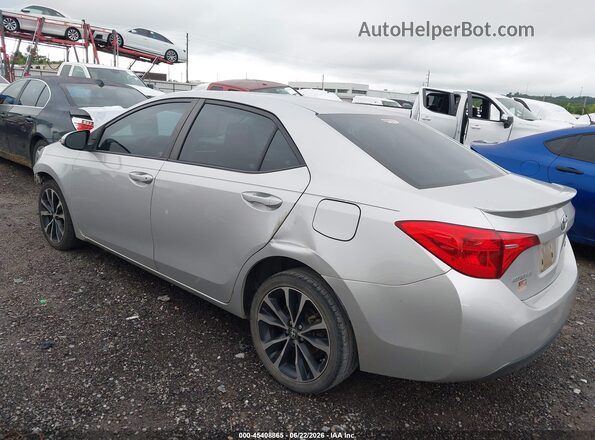 2T1BURHE2HC924166 2017 TOYOTA COROLLA Silver Trasero izquierdo