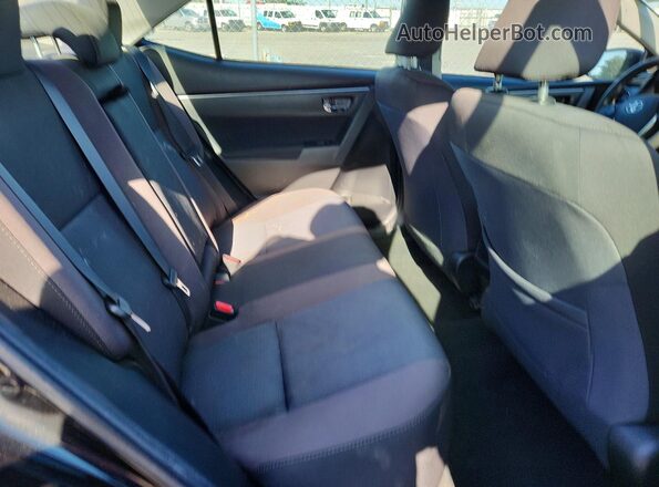 2T1BURHE2JC004687 2018 TOYOTA COROLLA Black Rear seats view
