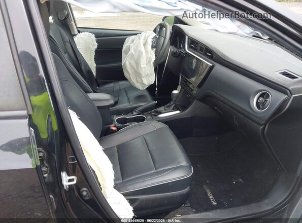2T1BURHE2JC017181 2018 TOYOTA COROLLA Black Front interior view