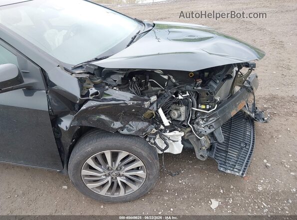 2T1BURHE2JC017181 2018 TOYOTA COROLLA Black Front view