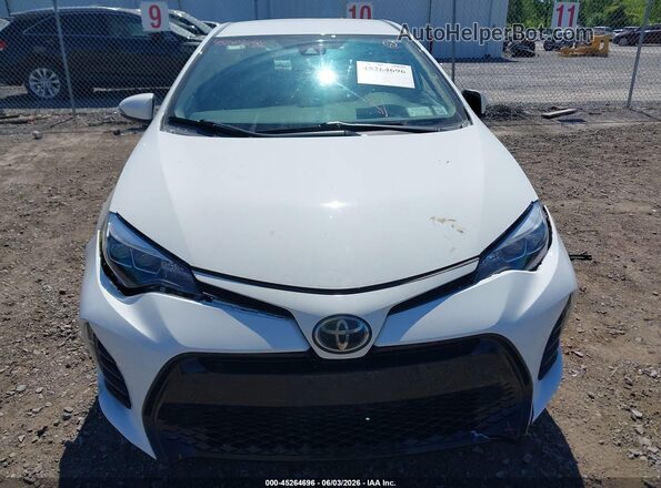 2T1BURHE2JC033106 2018 TOYOTA COROLLA White Vista del cuadro de instrumentos
