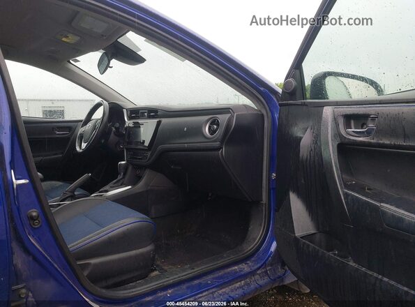 2T1BURHE2JC039259 2018 TOYOTA COROLLA Blue Front interior view