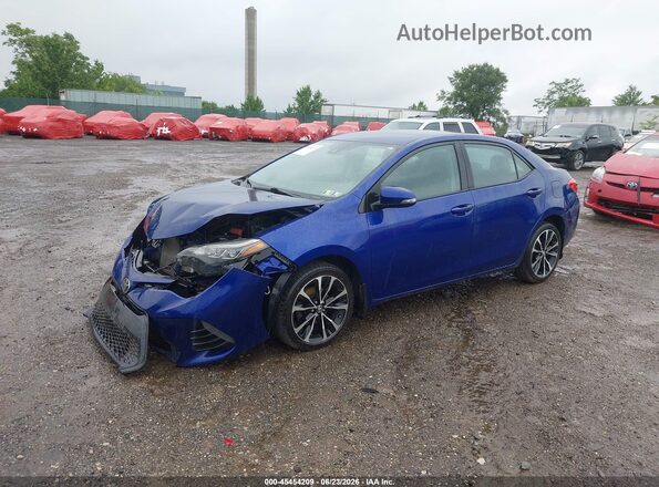 2T1BURHE2JC039259 2018 TOYOTA COROLLA Blue Front left