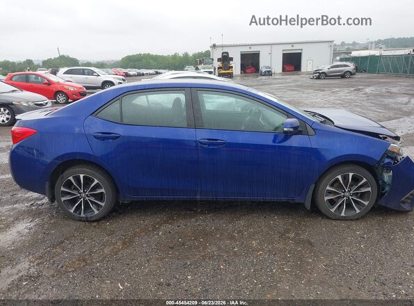 2T1BURHE2JC039259 2018 TOYOTA COROLLA Blue Rear interior view
