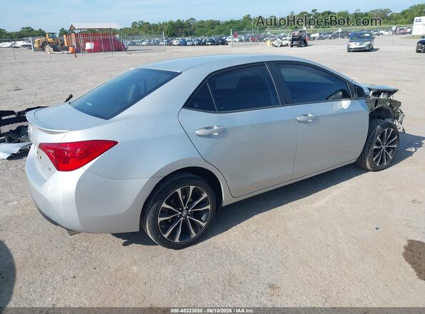 2T1BURHE2JC069703 2018 TOYOTA COROLLA Silver 