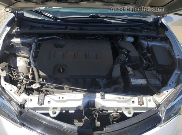 2T1BURHE2JC977066 2018 TOYOTA COROLLA Серебряный Вид задней части салона