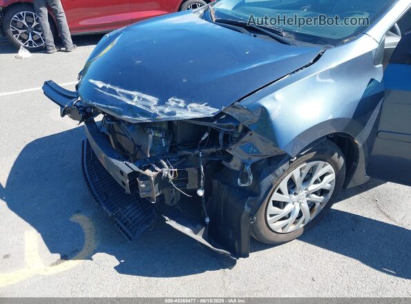 2T1BURHE2KC244677 2019 TOYOTA COROLLA Gray Widok z przodu