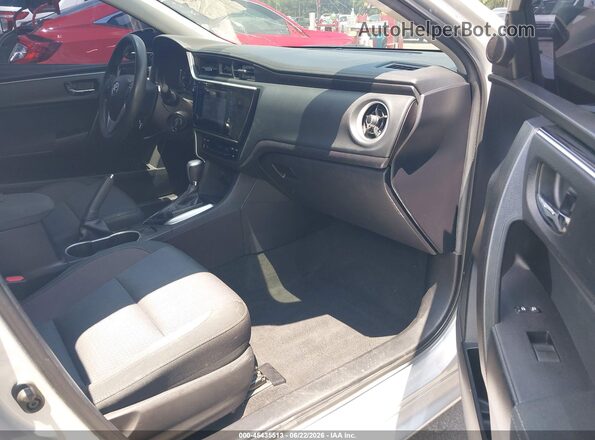 2T1BURHE3JC047922 2018 TOYOTA COROLLA Silver Vista interior delantera