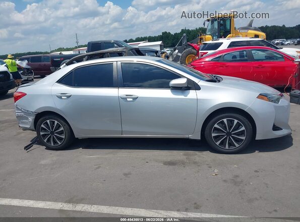 2T1BURHE3JC047922 2018 TOYOTA COROLLA Silver Vista interior trasera