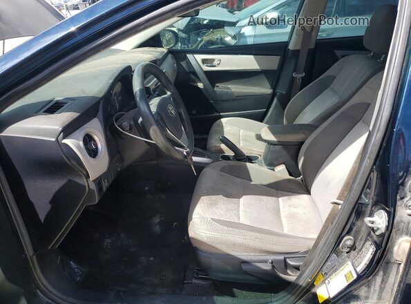 2T1BURHE3KC207749 2019 TOYOTA COROLLA Синий Вид салона спереди