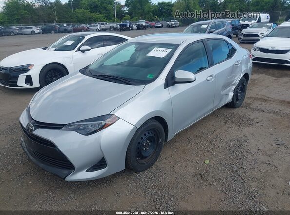 2T1BURHE3KC236877 2019 TOYOTA COROLLA Silver წინა მარცხენა ხედი სამი მეოთხედიდან