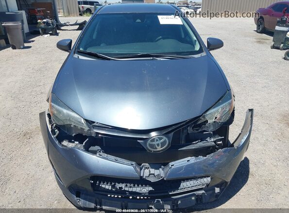 2T1BURHE4HC788106 2017 TOYOTA COROLLA Серый Вид задней части салона