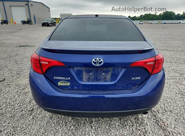 2T1BURHE4HC807611 2017 TOYOTA COROLLA Blue Вид ззаду