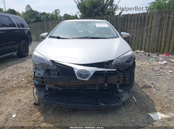 2T1BURHE4HC856307 2017 TOYOTA COROLLA Silver Սալոնի հետևի տեսք