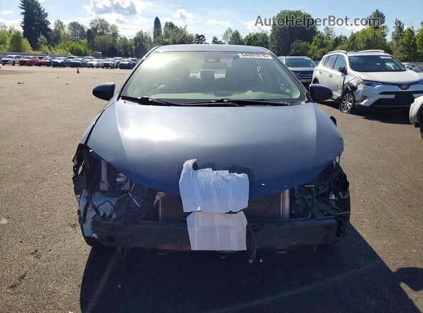 2T1BURHE4HC911466 2017 TOYOTA COROLLA Blue Front view