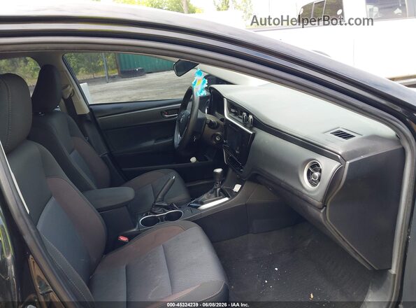 2T1BURHE4JC015450 2018 TOYOTA COROLLA Black წინა სალონის ხედი