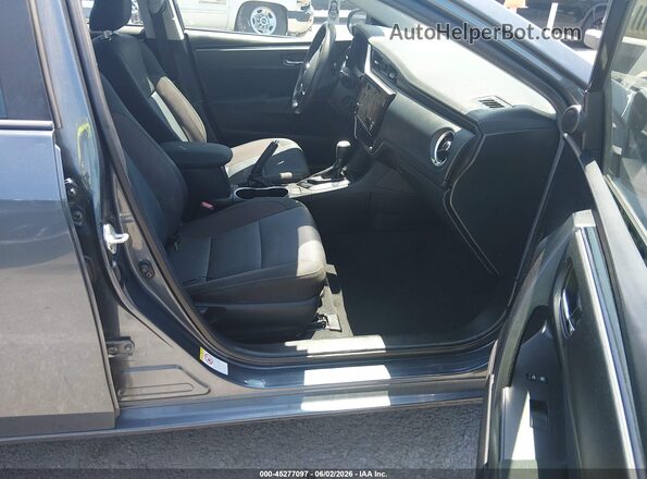 2T1BURHE4JC033589 2018 TOYOTA COROLLA Black Вид салону спереду