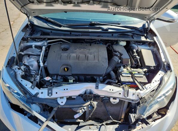 2T1BURHE4JC051980 2018 TOYOTA COROLLA Silver უკანა სალონის ხედი