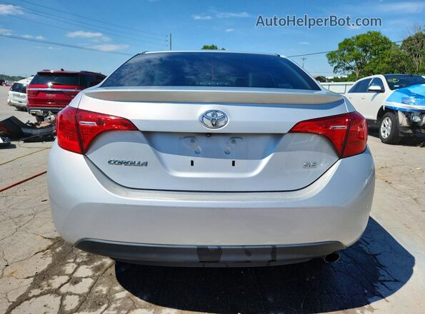2T1BURHE4JC051980 2018 TOYOTA COROLLA Silver უკანა ხედი