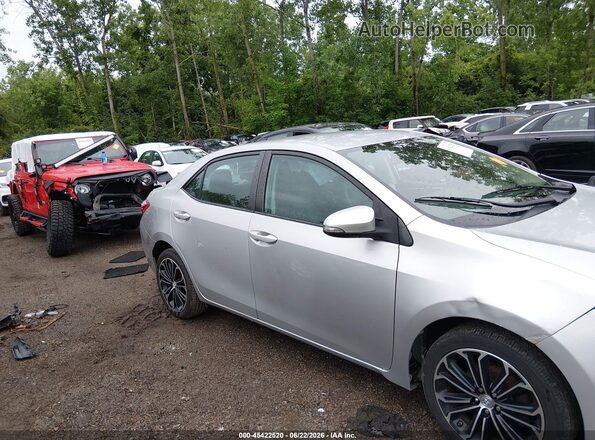 2T1BURHE5GC569122 2016 TOYOTA COROLLA Silver Vista interior trasera