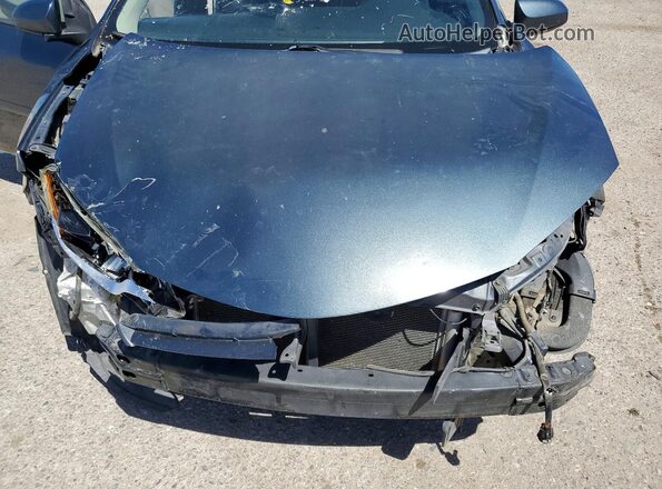 2T1BURHE5GC572814 2016 TOYOTA COROLLA Teal Սալոնի հետևի տեսք