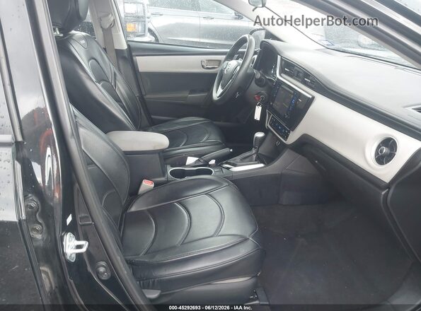 2T1BURHE5HC766938 2017 TOYOTA COROLLA Черный Вид салона спереди