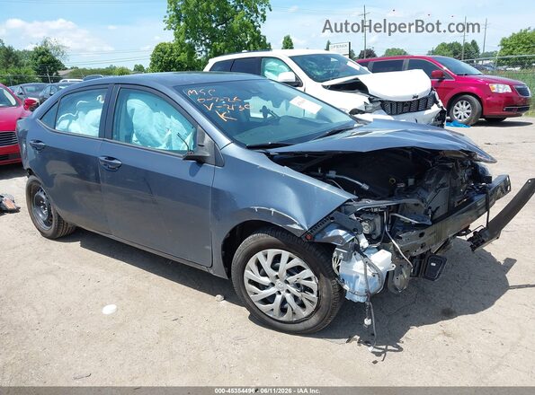 2T1BURHE5HC942130 2017 TOYOTA COROLLA Серый Вид задней части салона