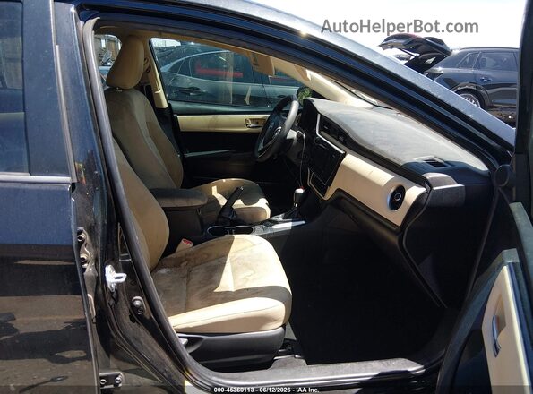 2T1BURHE5HC958425 2017 TOYOTA COROLLA Black Widok wnętrza z przodu