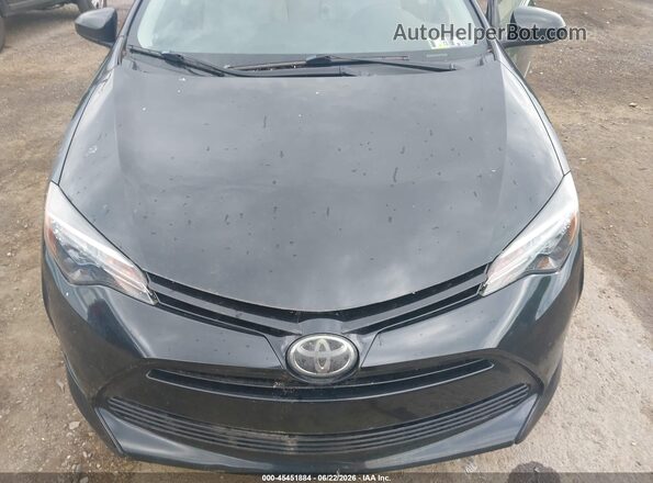 2T1BURHE5JC096703 2018 TOYOTA COROLLA Black Front view
