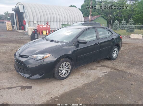 2T1BURHE5JC096703 2018 TOYOTA COROLLA Black Front left
