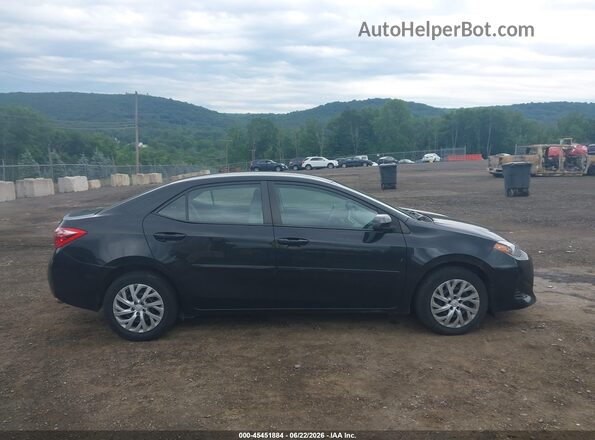 2T1BURHE5JC096703 2018 TOYOTA COROLLA Black Rear interior view