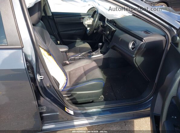 2T1BURHE5JC097303 2018 TOYOTA COROLLA Gray წინა სალონის ხედი