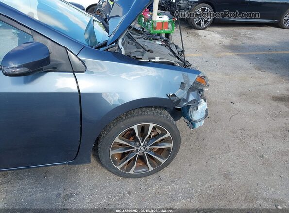 2T1BURHE5JC097303 2018 TOYOTA COROLLA Gray წინა ხედი