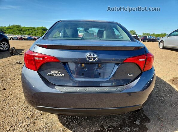 2T1BURHE6HC850332 2017 TOYOTA COROLLA Синий Вид сзади