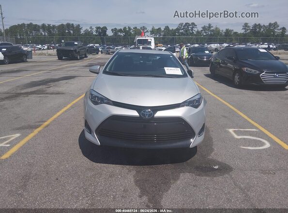 2T1BURHE6JC019046 2018 TOYOTA COROLLA Белый Вид панели приборов