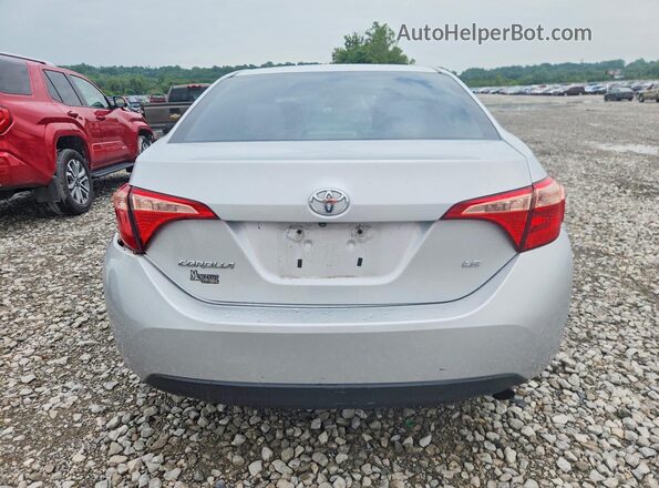 2T1BURHE6JC060986 2018 TOYOTA COROLLA Silver Rear view