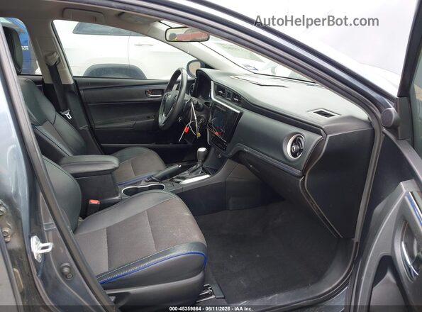 2T1BURHE6JC062947 2018 TOYOTA COROLLA Dark Blue Вид салона спереди