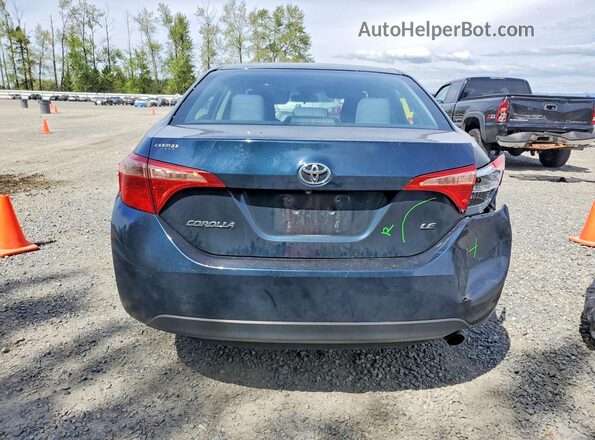 2T1BURHE7JC031819 2018 TOYOTA COROLLA Blue Rear view