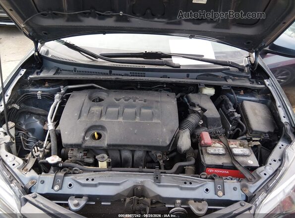 2T1BURHE7JC988435 2018 TOYOTA COROLLA Blue Vista trasera