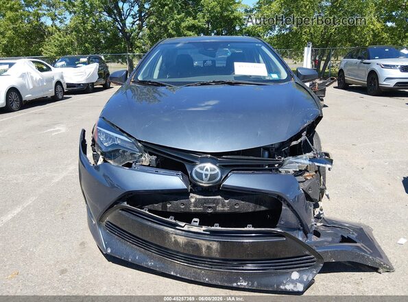 2T1BURHE7JC989522 2018 TOYOTA COROLLA Gray Вид спереду