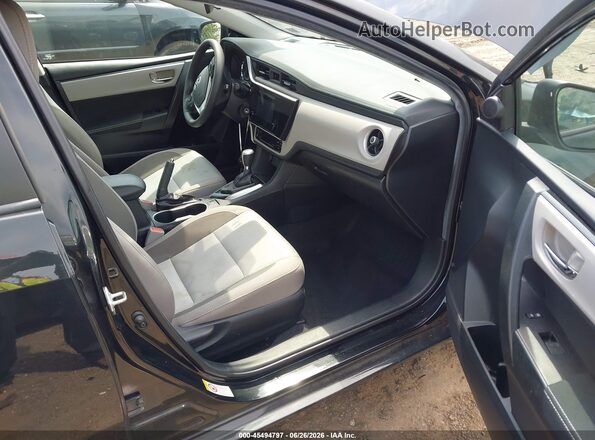 2T1BURHE7KC203915 2019 TOYOTA COROLLA Black Front interior view
