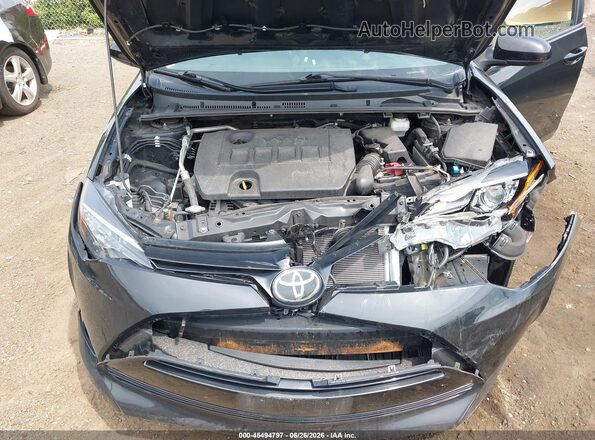 2T1BURHE7KC203915 2019 TOYOTA COROLLA Black Rear view