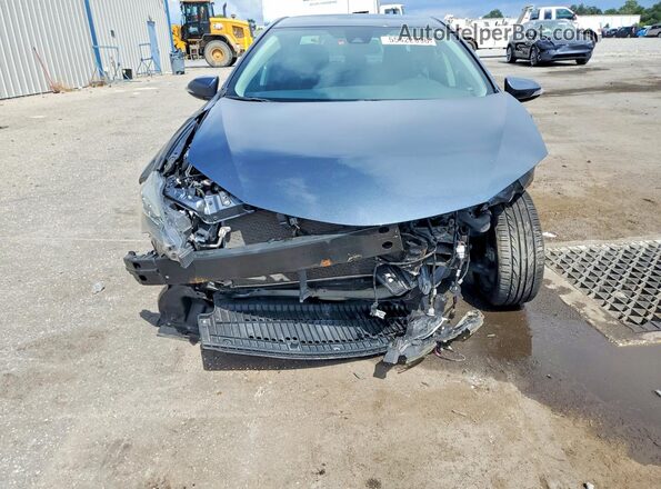 2T1BURHE7KC218981 2019 TOYOTA COROLLA Blue Front view