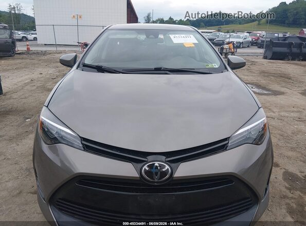 2T1BURHE7KC234985 2019 TOYOTA COROLLA Brown Widok wnętrza z tyłu