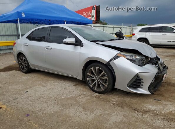 2T1BURHE7KC244657 2019 TOYOTA COROLLA Silver Front right