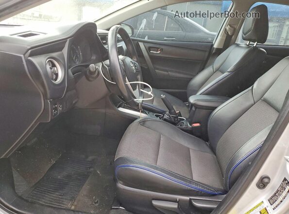 2T1BURHE7KC244657 2019 TOYOTA COROLLA Silver Front interior view