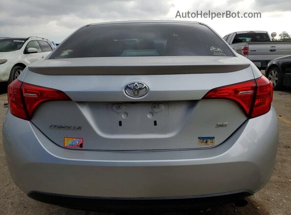 2T1BURHE7KC244657 2019 TOYOTA COROLLA Silver Rear view