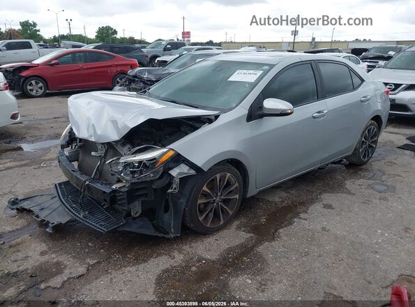 2T1BURHE8HC778114 2017 TOYOTA COROLLA Silver Vista tres cuartos delantera izquierda