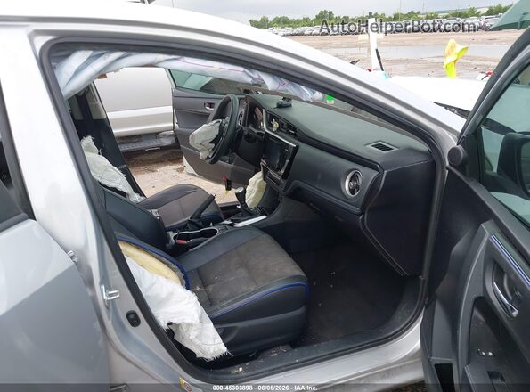 2T1BURHE8HC778114 2017 TOYOTA COROLLA Silver Vista interior delantera