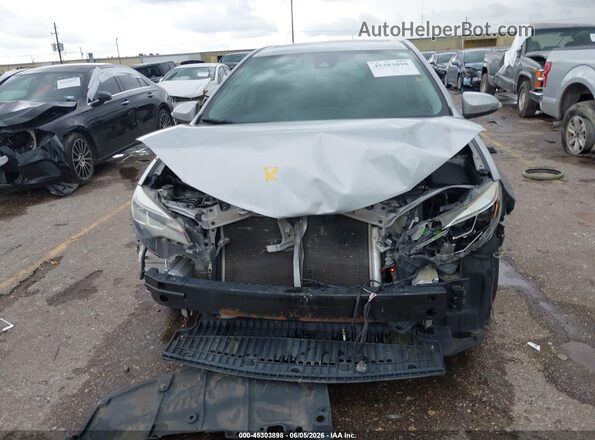 2T1BURHE8HC778114 2017 TOYOTA COROLLA Silver Vista interior trasera